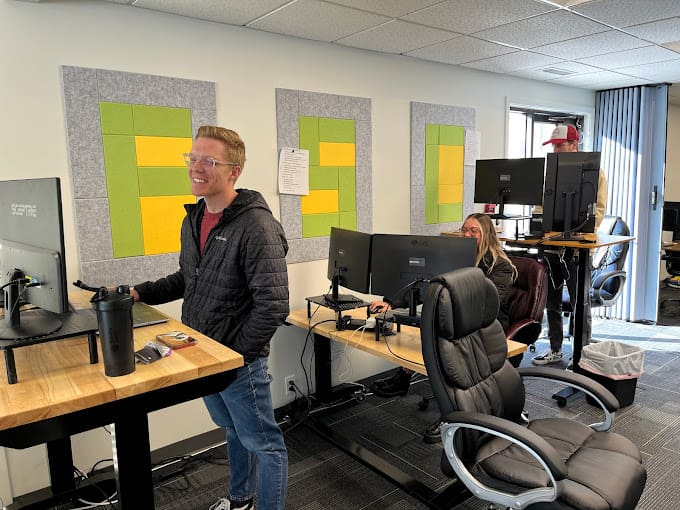 Picture of some team members working in the Five Star Commerce office